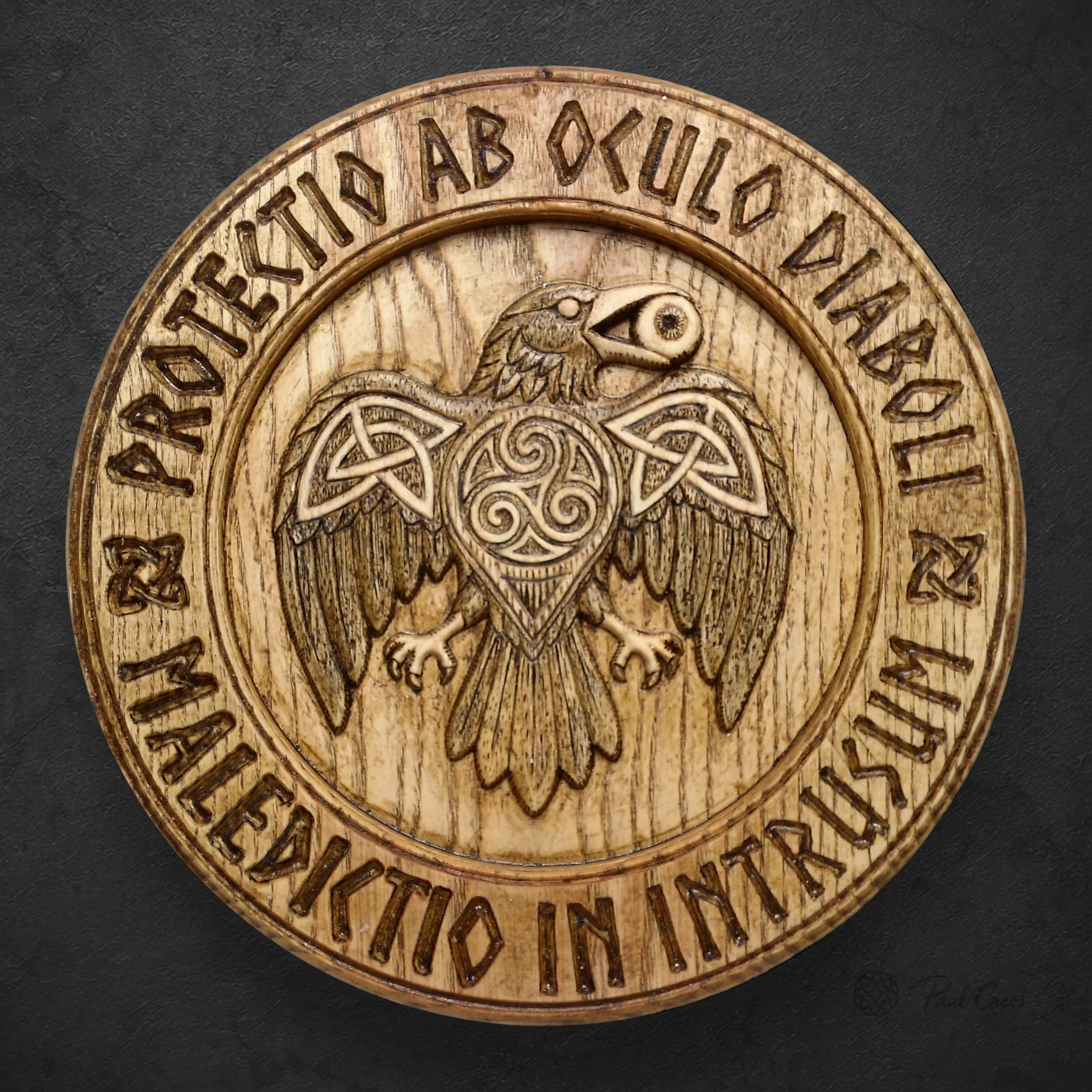 Raven Warden I thumbnail showing the carved raven and triskele on a dark textured background