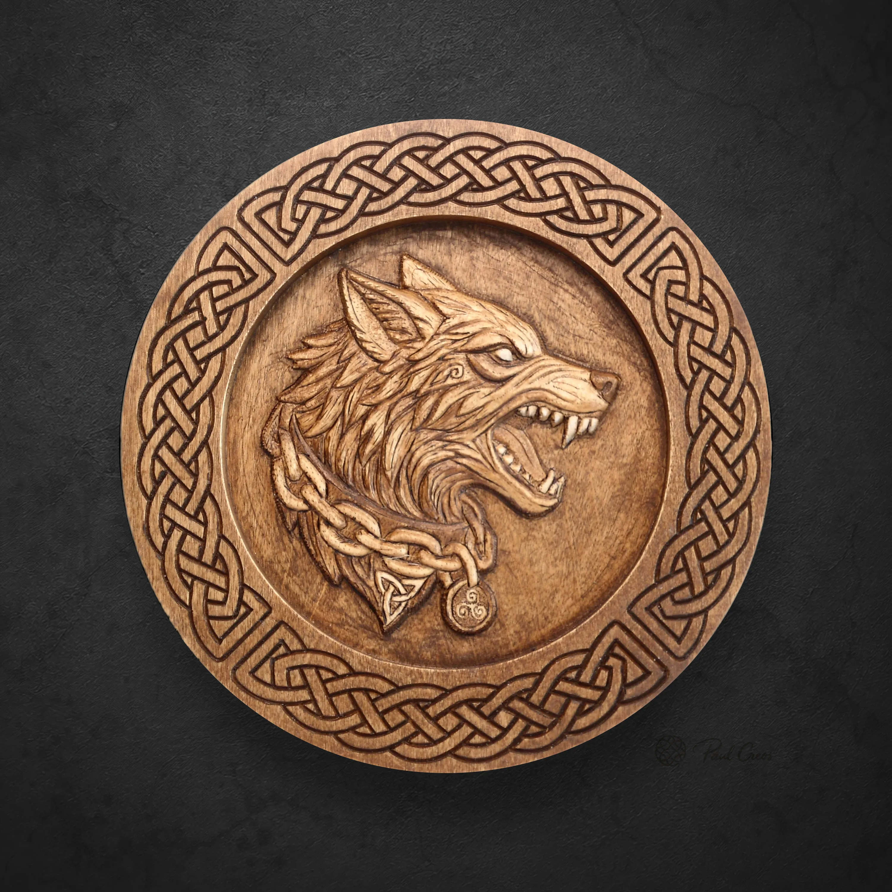 Wolf Warden I wooden roundel with a carved wolf, chain, pendants, and Celtic knotwork border