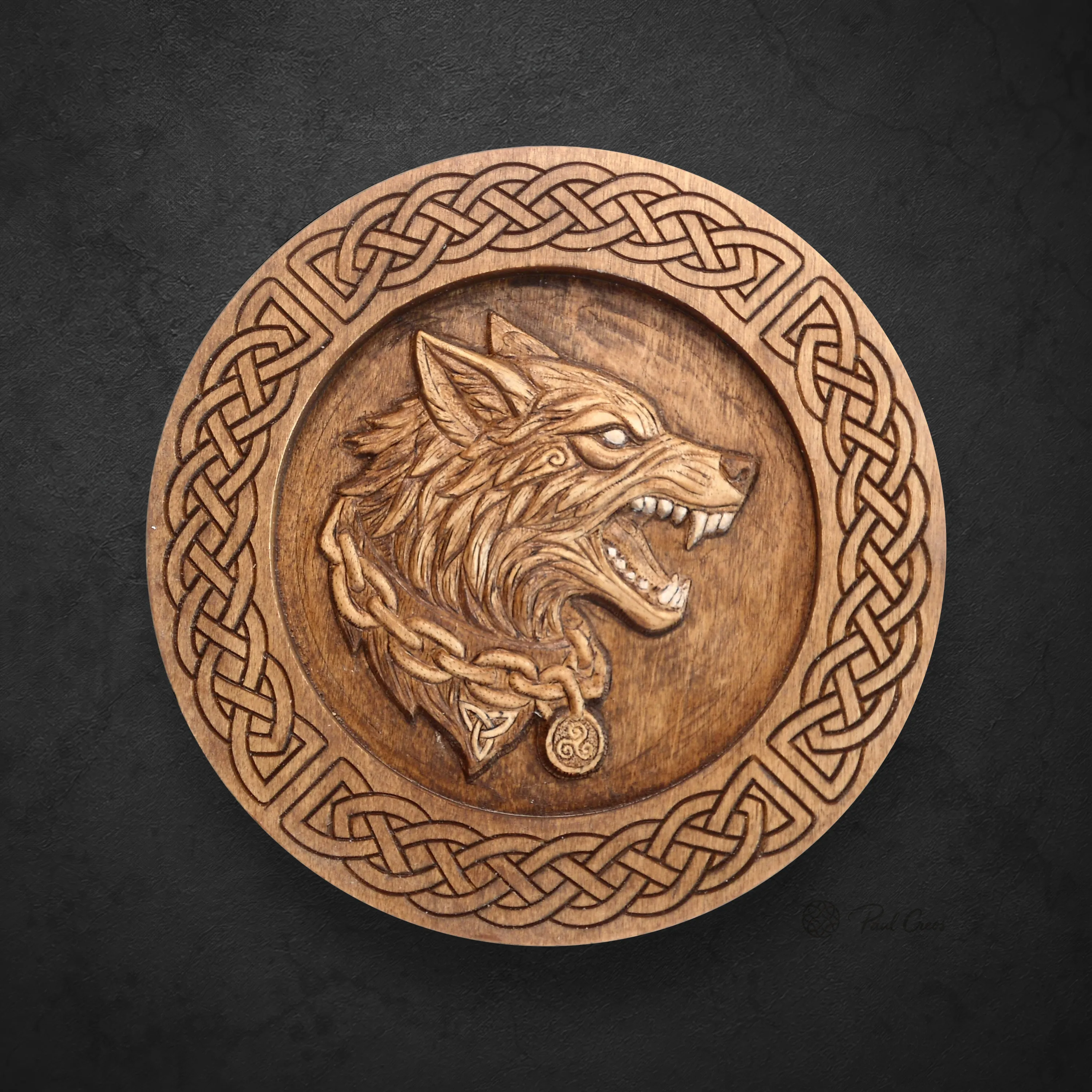 Wolf Warden II wooden roundel with a carved wolf, chain, pendants, and Celtic knotwork border